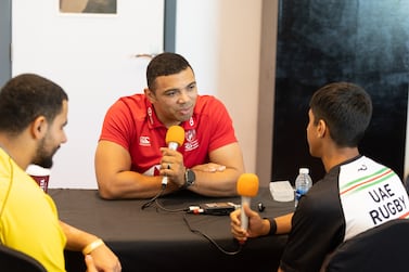 Bryan Habana, South African rugby union player, seen with young player in Dubai.
