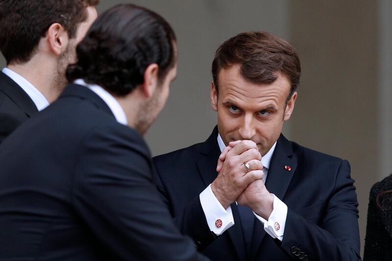 French President Emmanuel Macron gestures after receiving Saad Hariri at the Elysee Palace on November 18, 2017. Yoan Valat / EPA