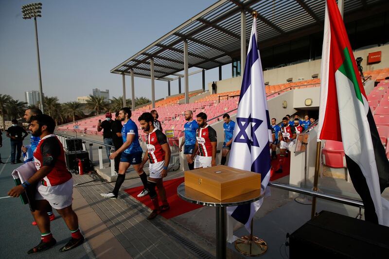Players enter the pitch before the friendly rugby match between UAE and Israel in Dubai. EPA