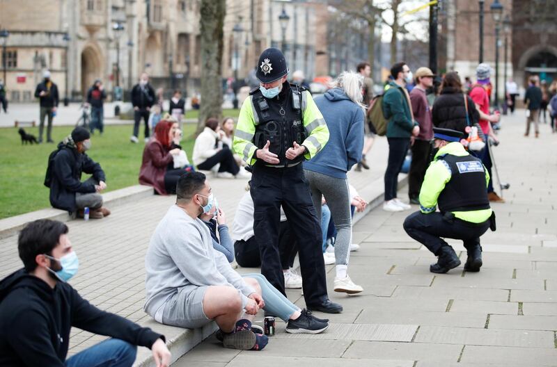 Police officers talk to people as crowds begin to gather in College Green, Bristol, ahead of the protest against a proposed bill to increase police powers. Reuters