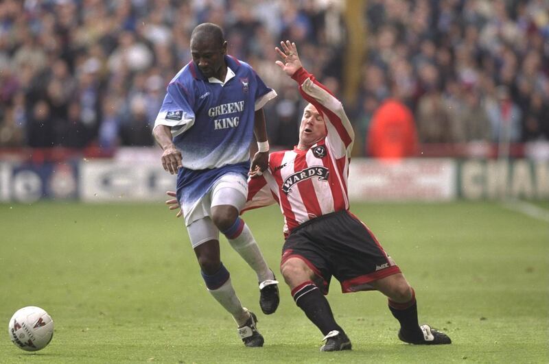 10 May 1997:  Gus Uhlenbeck of Ipswich shields the ball from Nick Henry of Sheffield United during the Division One Play Off at Bramwell Lane in Sheffield, England. The game was drawn 1-1. \ Mandatory Credit: Allsport UK /Allsport