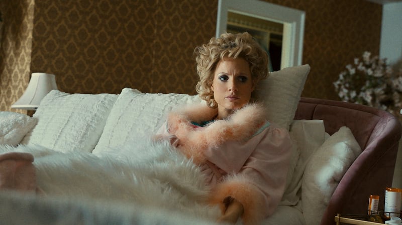 Jessica Chastain as Tammy Faye Bakker in a scene from 'The Eyes of Tammy Faye', which is up for two awards. Searchlight Pictures via AP