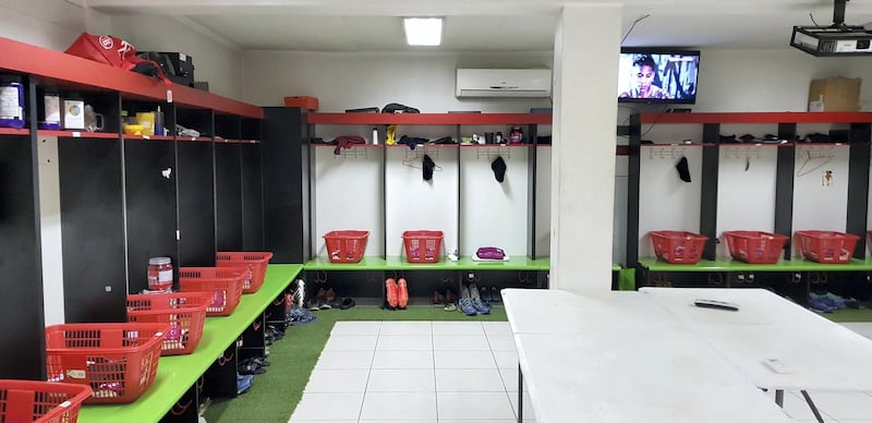 <p>Deportivo&nbsp;Palestino&#39;s changing room, painted in the colours of the Palestinian flags in&nbsp;keeping with the stadium&#39;s theme. Juman Jarallah&nbsp;/ The National&nbsp;</p>
