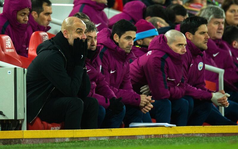 epa06438431 Manchester City manager Pep Guardiola (L) reacts during the English Premier League soccer match between Liverpool FC and Manchester City at Anfield in Liverpool, Britain, 14 January 2018. Liverpool won 4-3.  EPA/PETER POWELL EDITORIAL USE ONLY. No use with unauthorized audio, video, data, fixture lists, club/league logos or 'live' services. Online in-match use limited to 75 images, no video emulation. No use in betting, games or single club/league/player publications
