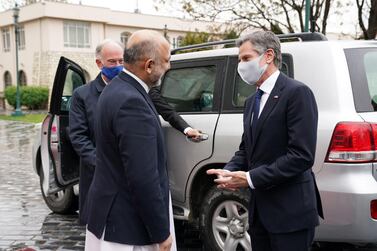 Afghanistan's Foreign Minister Mohammad Haneef Atmar greets US Secretary of State Antony Blinken in Kabul. Afghan Presidential Palace / AFP