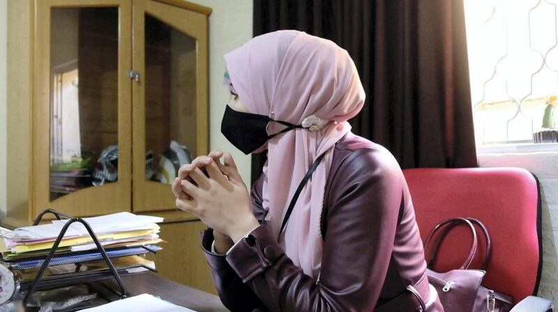 Saafa Hijazi, the principle of a local kindergarten in Al Baqa’a camp, sits in her school office. Amy McConaghy/ The National