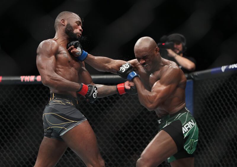 Leon Edwards and Kamaru Usman exchange punches  during their welterweight title bout at UFC 286. PA