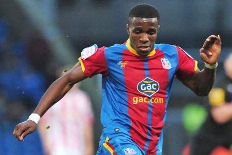 Wilfried Zaha could move to Manchester United next season. Carl Court / AFP