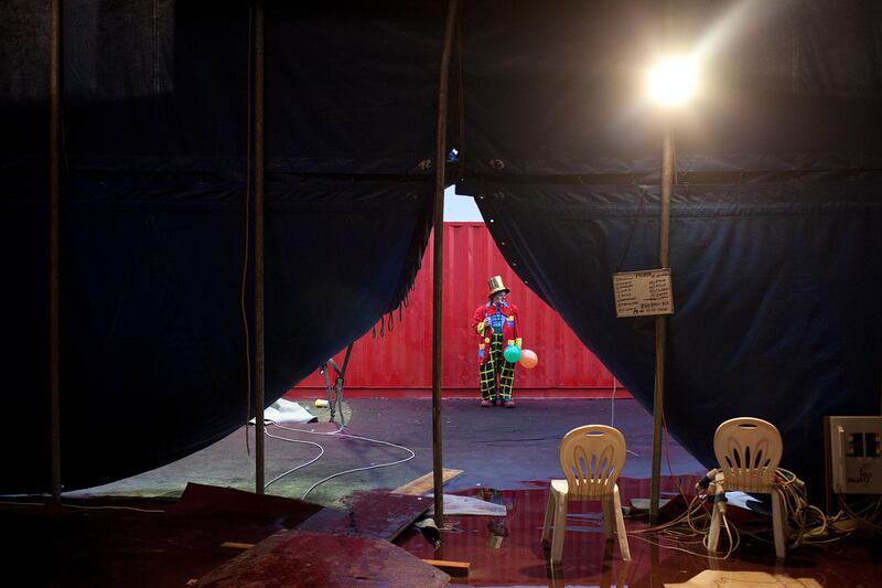 Abu Dhabi, United Arab Emirates, April 28, 2013: 
A clown takes a moment to himself backstage before his evening performance at the Monte Carlo circus on Tuesday, April 28, 2013, at the circus new temporary location in Mussafah, an industrial subsection of Abu Dhabi. 
Silvia Razgova / The National
