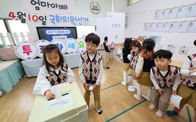Children participate in a mock vote at a nursery in Incheon, South Korea. EPA
