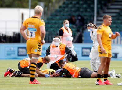 FILE PHOTO: Rugby Union - Premiership - Saracens v Wasps - Allianz Park, London, Britain - September 5, 2020  Wasps' Charlie Atkinson is treated my medical staff after at late tackle from Saracens' Owen Farrell   Action Images/Paul Childs/File Photo