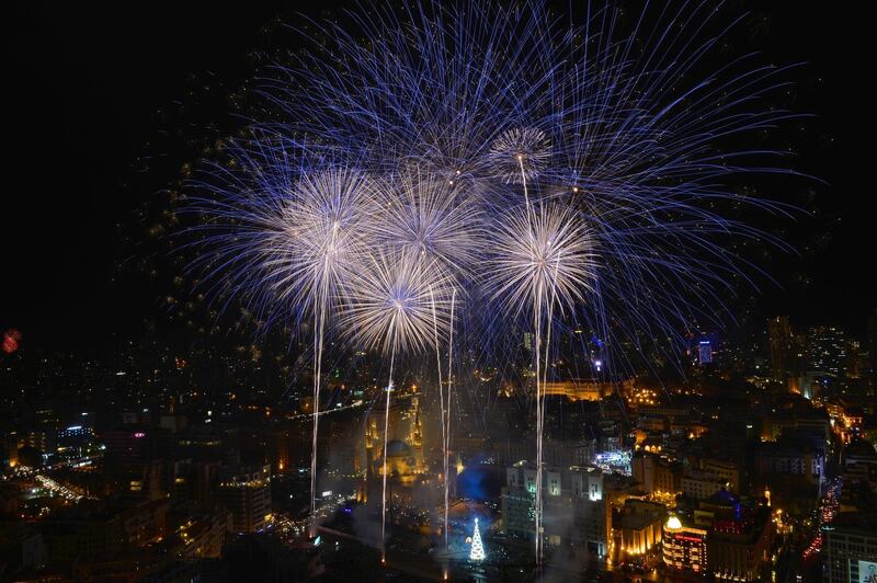 Fireworks illuminate the night sky during New Year's celebrations in Beirut, Lebanon.  EPA
