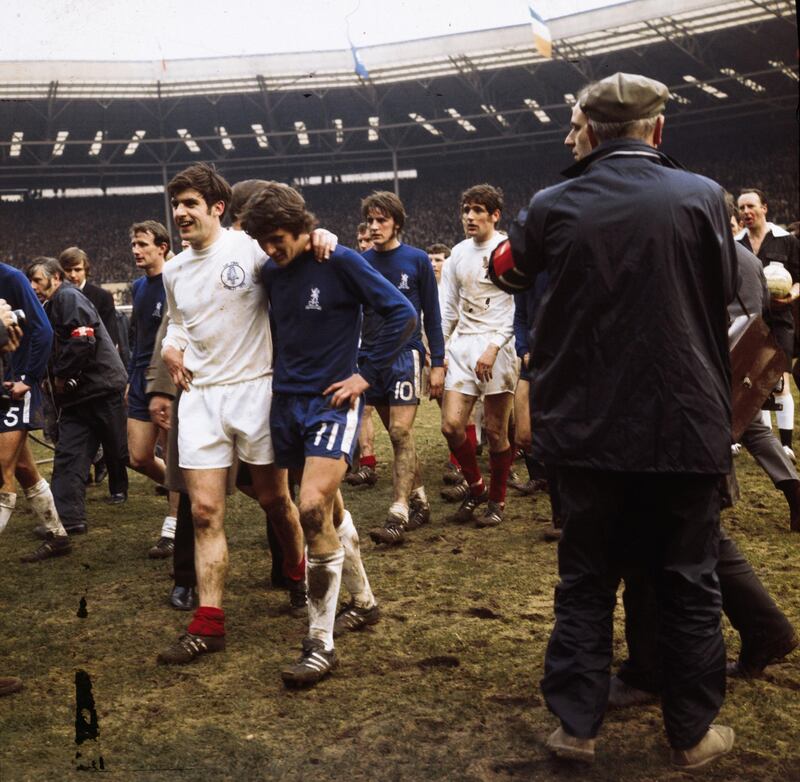 11th April 1970:  Members of Chelsea and Leeds United walking off the pitch at Wembley Stadium after their 2-2 draw in the FA Cup final. Chelsea won the replay.  (Photo by Victor Drees/Express/Getty Images)