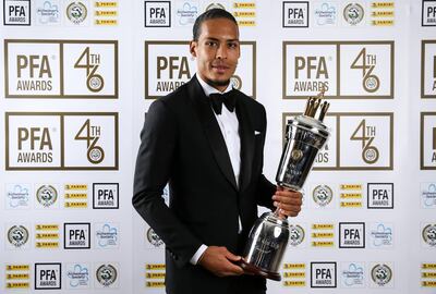 Liverpool's Virgil van Dijk poses with his PFA Player of the Year award during the 2019 PFA Awards at the Grosvenor House Hotel, London. PRESS ASSOCIATION Photo. Picture date: Sunday April 28, 2019. See PA story SOCCER PFA. Photo credit should read: Barrington Coombs/PA Wire