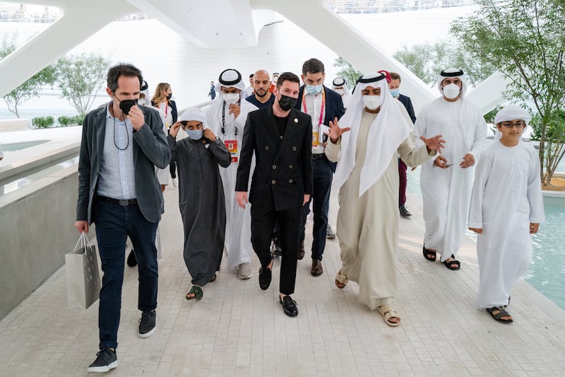 Lionel Messi and Sheikh Nahyan bin Mubarak, Minister of Tolerance and Coexistence, Commissioner General, third left, front row.