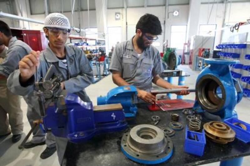 ABU DHABI.12th March. 2009. Students at work in the Mechanical workshop at the ADNOC Technical Institute in Abu Dhabi. Stephen Lock  /  The National. FOR BUSINESS *** Local Caption ***  SL-adnoc-016.jpg