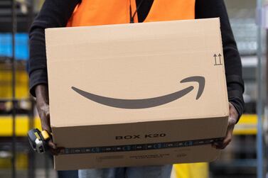 Companies are working around the clock to cope with a surge in online orders. Sebastian Kahnert / Getty Images