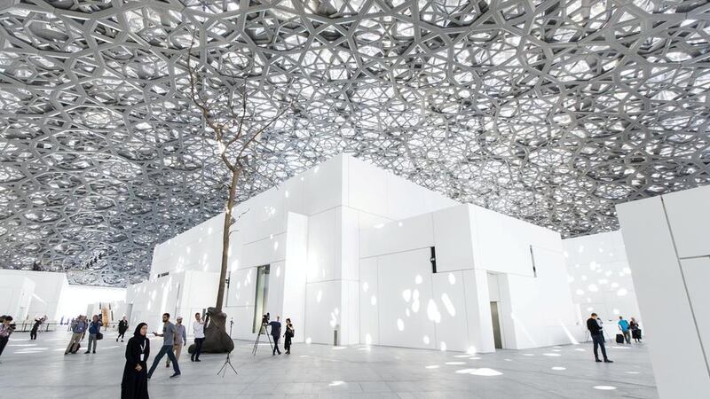 More than 60 per cent of visitors to Louvre Abu Dhabi are first-time visitors to the country, intrigued by Jean Nouvel's Arabic design. Christopher Pike / The National