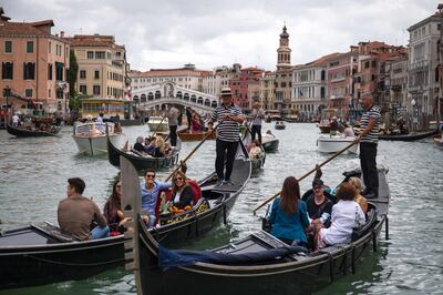 Venice is tackling overtourism by introducing summer fees. AFP