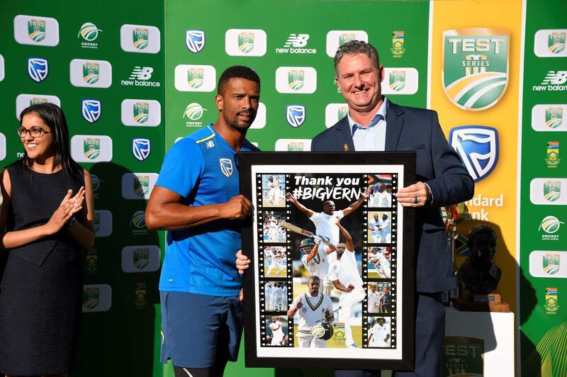 Vernon Philander is is presented with a memento after playing his final Test for South Africa. AFP