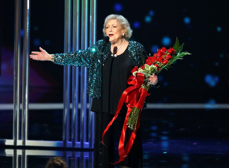 Betty White, in an emerald sequinned jacket, accepts the Favourite TV Icon award during the 2015 People's Choice Awards in Los Angeles, California, January 7, 2015. Reuters