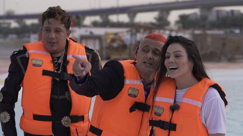 Left to right: Egyptian singer Hamo Bika, Ramez Galal and dancer Lurdiana get in on the joke on 'Ramez Aqlahu Tar'. Twitter / Ramezgalal