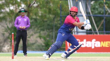 Alishan Sharafu of UAE plays a shot of UAE in the ACC Men's Premier Cup 2024 Group B match between the United Arab Emirates (UAE) and Kuwait in Oman Cricket Stadium in Al Amerat, Muscat, Oman on 12th April 2024. Photo By: Subas Humagain for The National