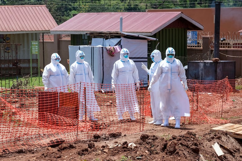 Doctors at the Ebola isolation section of Mubende Regional Referral Hospital. AP