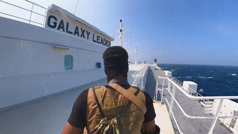 A Houthi fighter on the Galaxy Leader cargo ship in the Red Sea. Reuters