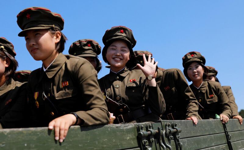 A soldier waves after visiting a natural history museum and zoo in Pyongyang, North Korea. Danish Siddiqui/Reuters