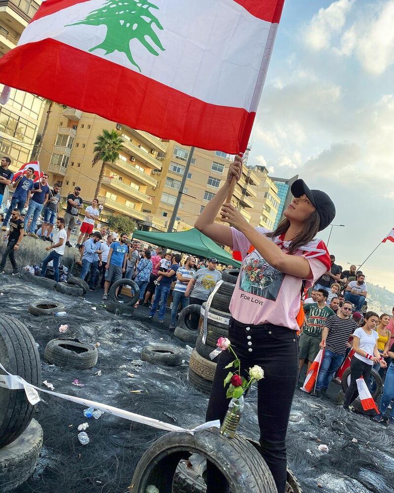 Daniella Rahme wrote "for a better Lebanon, for the Lebanon we all dream of, for a Lebanon we can all stay in, please come down and let's make our dreams come true. I'm staying where my heart belongs". Credit: Daniella Rahme
