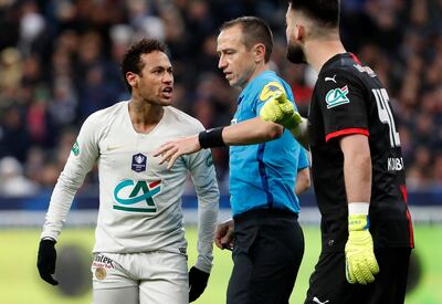 PSG's Neymar, left, argues with Rennes' goalkeeper Tomas Koubek, right, during the French Cup soccer final between Rennes and Paris Saint Germain at the Stade de France stadium in Saint-Denis, outside Paris, France, Saturday, April 27, 2019. (AP Photo/Thibault Camus)