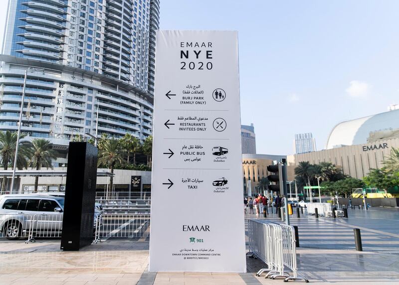 DUBAI, UNITED ARAB EMIRATES. 30 DECEMBER 2019. Signs directing crowds to Downtown Dubai NYE’s celebrations.

(Photo: Reem Mohammed/The National)

Reporter:
Section: