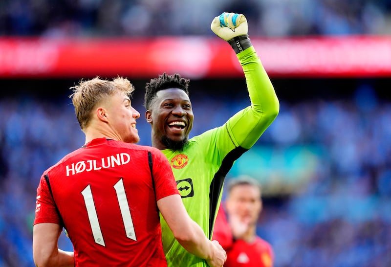 United goalkeeper Andre Onana celebrates with Rasmus Hojlund after the match. AP