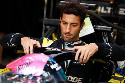 epa08421205 (FILE) - Australian Formula One driver Daniel Ricciardo of Renault prepares for the first practice session ahead of the Singapore Formula One Grand Prix in Singapore, 20 September 2019 (re-issued on 14 May 2020). McLaren Racing, on 14 May 2020, announced to have signed Daniel Ricciardo 'to a multi-year agreement to race for the team in the Formula One World Championship from 2021'. McLaren also announced that Spanish driver Carlos Sainz will leave the team at the end of the 2020.  EPA/DIEGO AZUBEL *** Local Caption *** 55481466