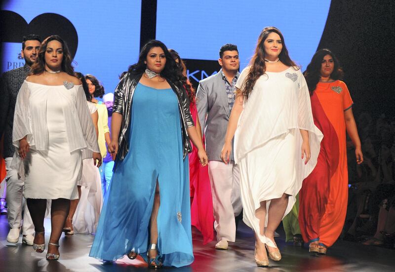 Indian models showcase creations by designer Wendell Rodricks at Lakme Fashion Week (LFW) Winter/Festive 2017 in Mumbai on August 19, 2017. - Lakme Fashion Week is taking place in Mumbai from August 16-20. (Photo by Sujit Jaiswal / AFP)