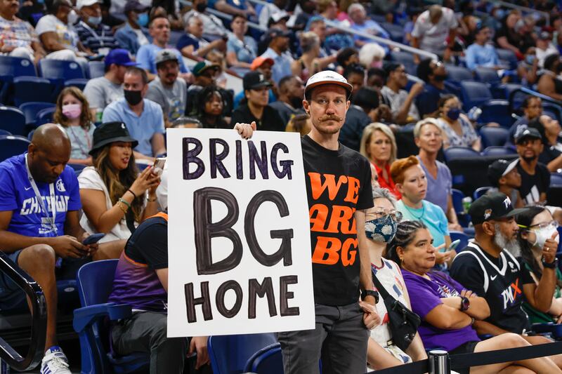 A man holds a sign for Brittney Griner Home during the first half of the WNBA game between the Chicago Sky and Phoenix Mercury at Wintrust Arena in Chicago, Illinois. EPA
