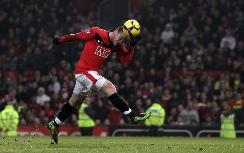 MANCHESTER, ENGLAND - JANUARY 23:  Wayne Rooney of Manchester United scores a header and completes a hat-trick during the Barclays Premier League match between Manchester United and Hull City at Old Trafford on January 23, 2010 in Manchester, England.  (Photo by Julian Finney/Getty Images)
