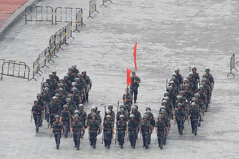 Chinese servicemen attend a crowd control exercise. Reuters