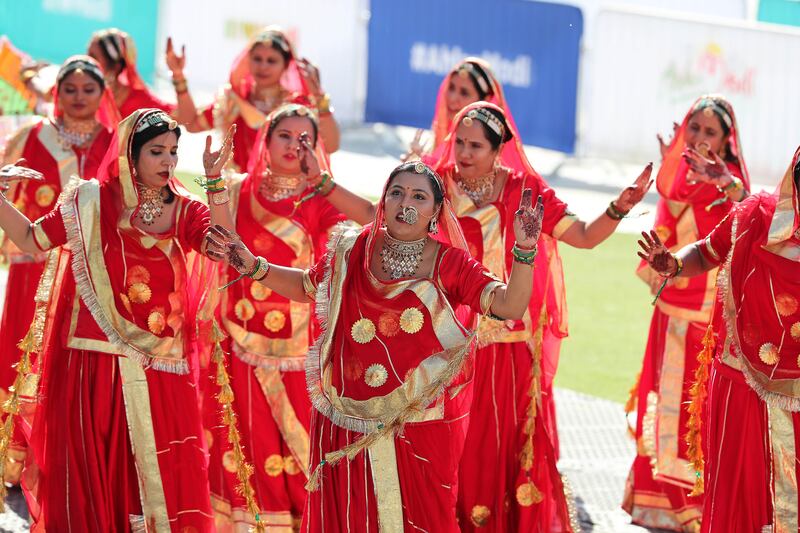 A colourful parade featuring dancers kept the crowd entertained in the hours leading up to the arrival of Indian Prime Minister Narendra Modi