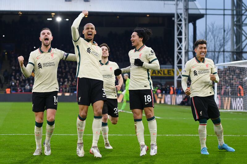 Fabinho, second left, celebrates after scoring Liverpool's third goal. Getty