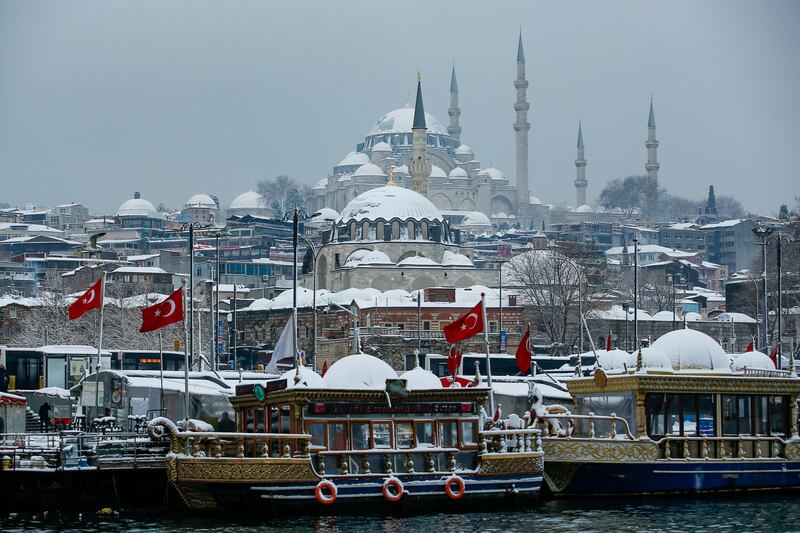 Tourist boats dock in the Golden Horn with Suleymaniye Mosque in the background. AP