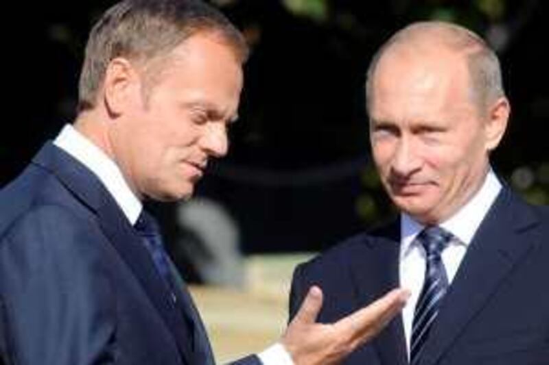 Russian Prime Minister Vladimir Putin, right, talks with his Polish counterpart Donald Tusk in Sopot, northern Poland, Tuesday, Sept. 1, 2009. Putin came to Poland to attend WW II anniversary celebrations. (AP Photo/Alik Keplicz) *** Local Caption ***  XAK153_Poland_Russia_WWII_Anniversary_.jpg