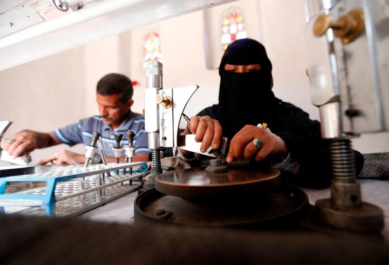 Safa al-Faqih crafts a stone in the old city of the capital, Sanaa, on April 18, 2018. Mohammed Huwais / AFP Photo