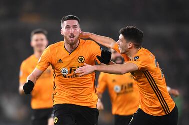 Matt Doherty of Wolves celebrates after scoring his side's third goal against Manchester City at Molineux. Getty