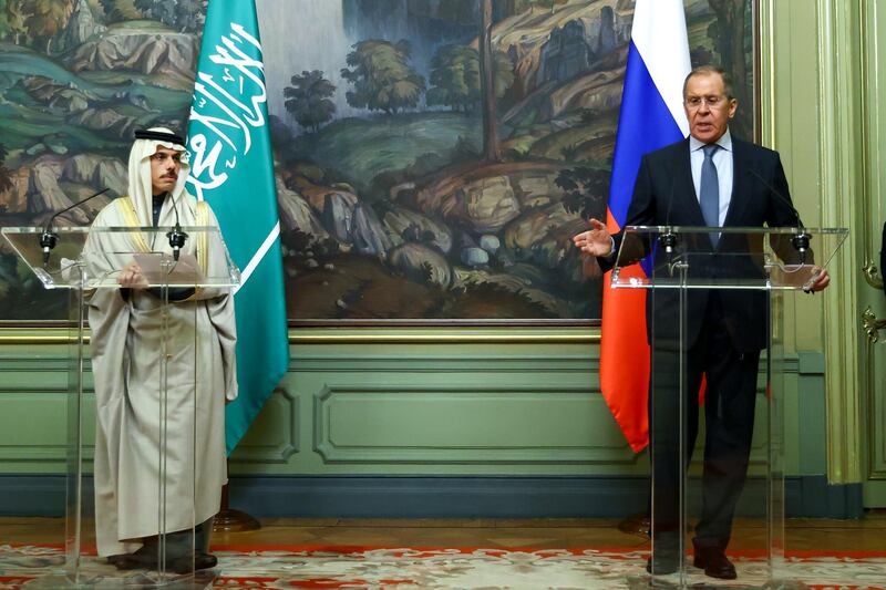 Russian Foreign Minister Sergey Lavrov, right, and Saudi Foreign Minister Prince Faisal bin Farhan Al-Saud attend a joint news conference following the talks in Moscow, Russia, Thursday, Jan. 14, 2021. (Russian Foreign Ministry Press Service via AP)