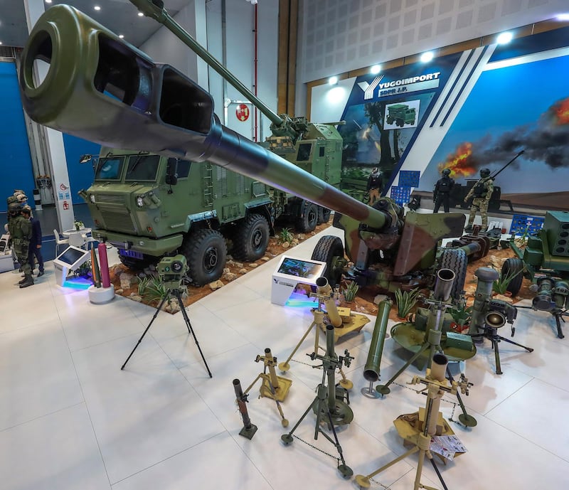 Abu Dhabi, U.A.E., February 20, 2019. INTERNATIONAL DEFENCE EXHIBITION AND CONFERENCE  2019 (IDEX) Day 4--  Visitors look at the military hardware at the YUGOIMPORT stands.
Victor Besa/The National
Section:  NA