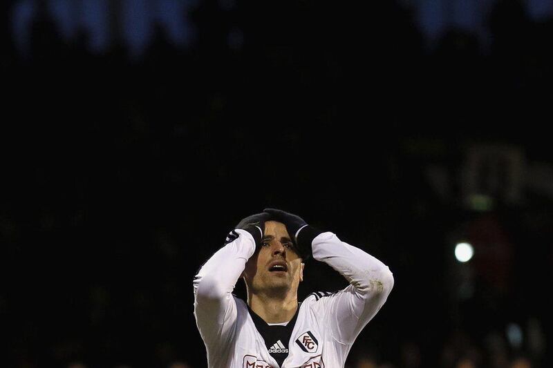 UAE football fans are almost as frustrated as Fulham's Dimitar Berbatov, pictured here in the match against Swansea City which wasn't shown on Al Jazeera. Reuters/Stefan Wermuth 