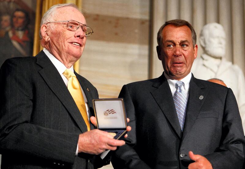 WASHINGTON, DC - NOVEMBER 16: Speaker of the House John Boehner (R-OH) holds back tears as he presents Astronaut Neil Armstrong (L) with the Congressional Gold Medal during a ceremony in the Rotunda of the U.S. Capitol November 16, 2011 in Washington, DC. The gold medals were presented to Armstrong and his fellow crew members from Apollo 11, Michael Collins and Buzz Aldrin, and to astronaut and former U.S. Senator John Glenn (D-OH), the first American to orbit the Earth.   Chip Somodevilla/Getty Images/AFP (Photo by CHIP SOMODEVILLA / GETTY IMAGES NORTH AMERICA / Getty Images via AFP)