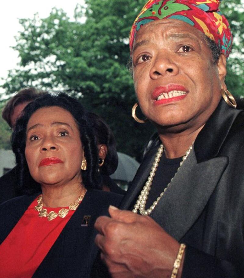 Coretta Scott King, left, widow of slain civil rights leader Martin Luther King Jr, and Maya Angelou speak to members of the media after visiting Betty Shabazz, the widow of slain civil rights activist Malcolm X, at Jacobi Hospital in the Bronx, NY on June 2, 1997. Jon Levy / AFP